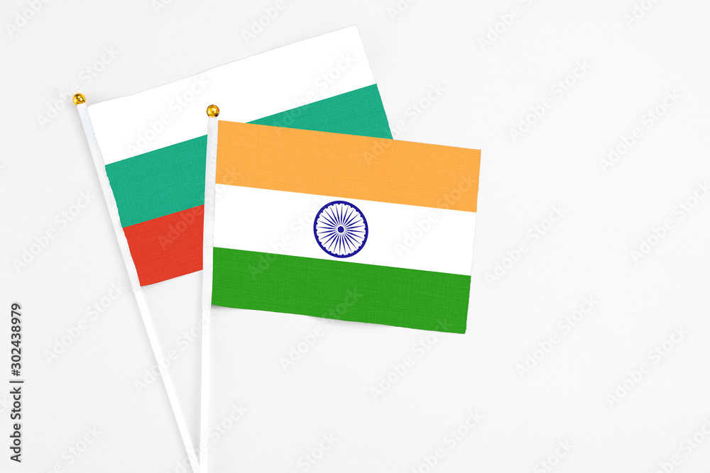 India and Bulgaria stick flags on white background. High quality fabric, miniature national flag. Peaceful global concept.White floor for copy space. India and Bulgaria stick flags on white background. High quality fabric, miniature national flag. Peaceful global concept.White floor for copy space.