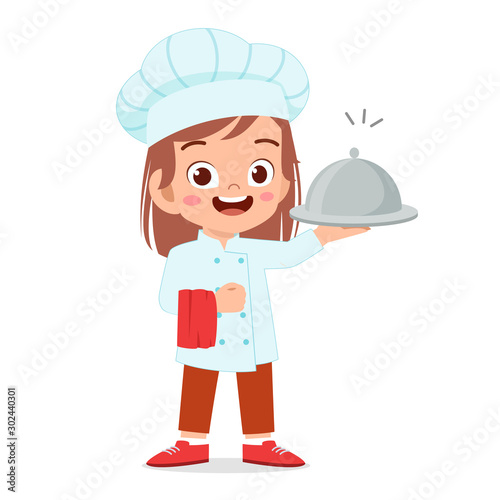 happy cute kid girl in chef costume
