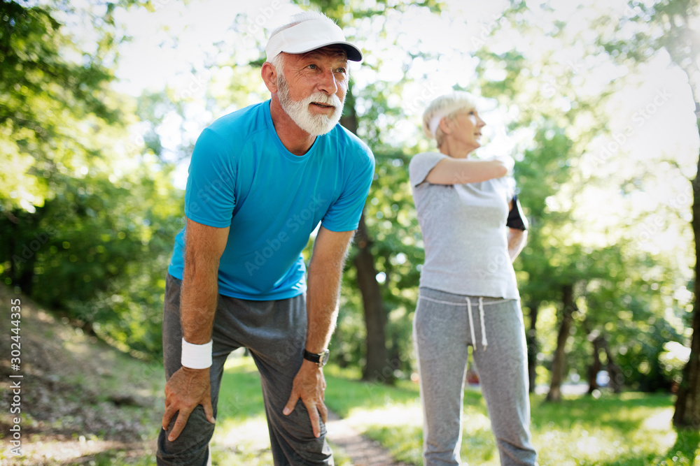 Happy senior people running to stay helathy and lose weight Happy senior people running to stay helathy and lose weight