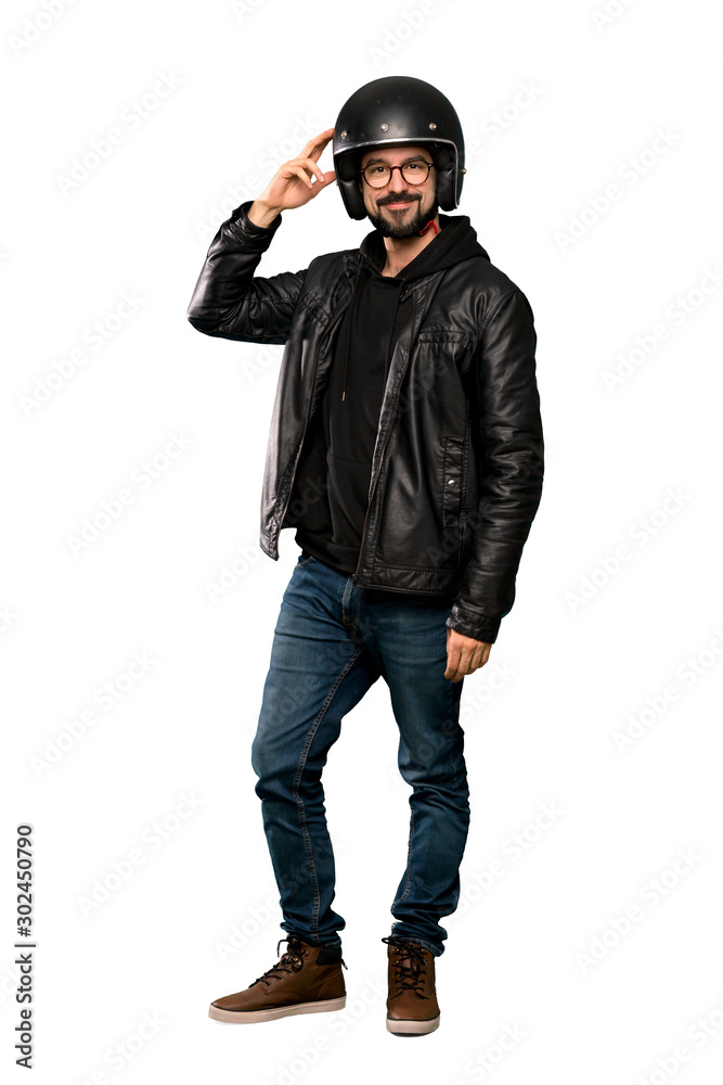 Full-length shot of Biker man with glasses and smiling over isolated white background