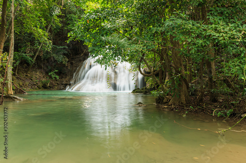 Deep forest of Waterfall Huay Mae Kamin National Park in Kanchanaburi Province, Thailand.