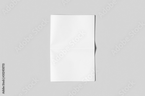 фотографія Blank newspaper mockup on a grey backgound.
