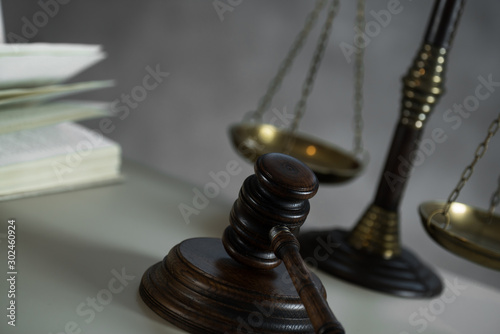 Judge mallet with law books and scales of justice. concept of justice, legal, jurisprudence. 