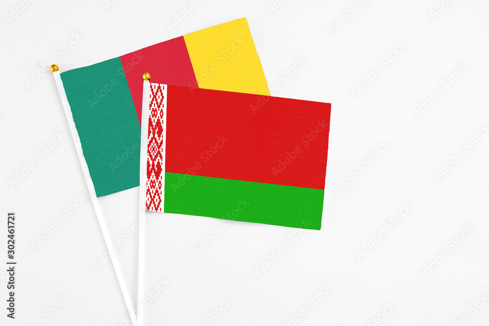 Belarus and Cameroon stick flags on white background. High quality fabric, miniature national flag. Peaceful global concept.White floor for copy space. Belarus and Cameroon stick flags on white background. High quality fabric, miniature national flag. Peaceful global concept.White floor for copy space.