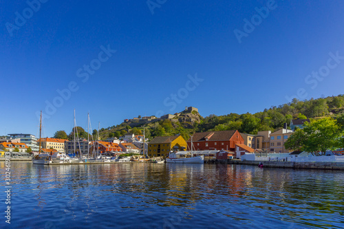 Halden waterfront during sunny, summer day with the Fredriksten fortress as the backdrop. Ostfold County, Norway. photo