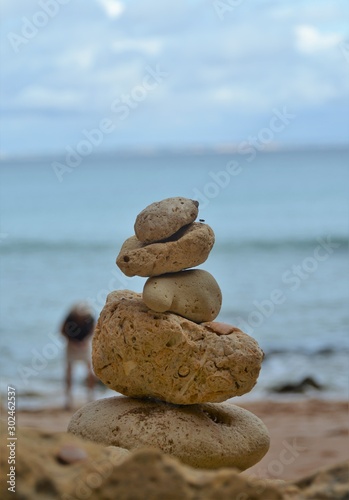 a pyramid of stones set in balance