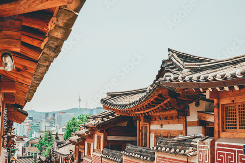 local travel with traditional house and clothing in korea from beautiful classic vintage of roof and building travel landmark name is bukchon hannok