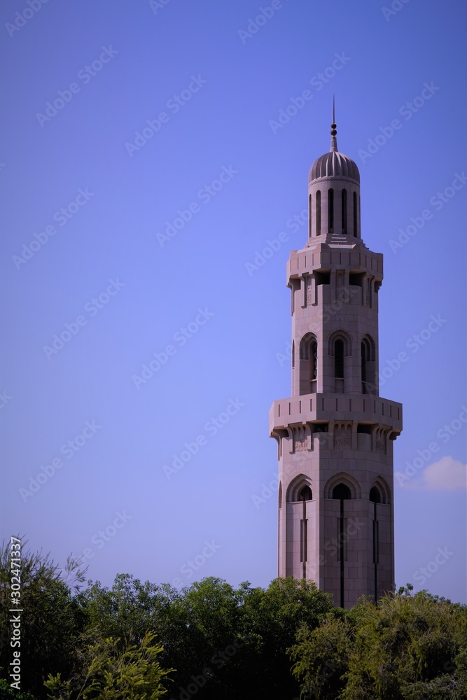 marble minaret of grand mosque in oman
