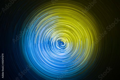 Abstract background. luminous swirling. Elegant glowing circle. Light ring. Sparking particle. Space tunnel. Colorful ellipse. Glint sphere. Bright border. Energy ball.