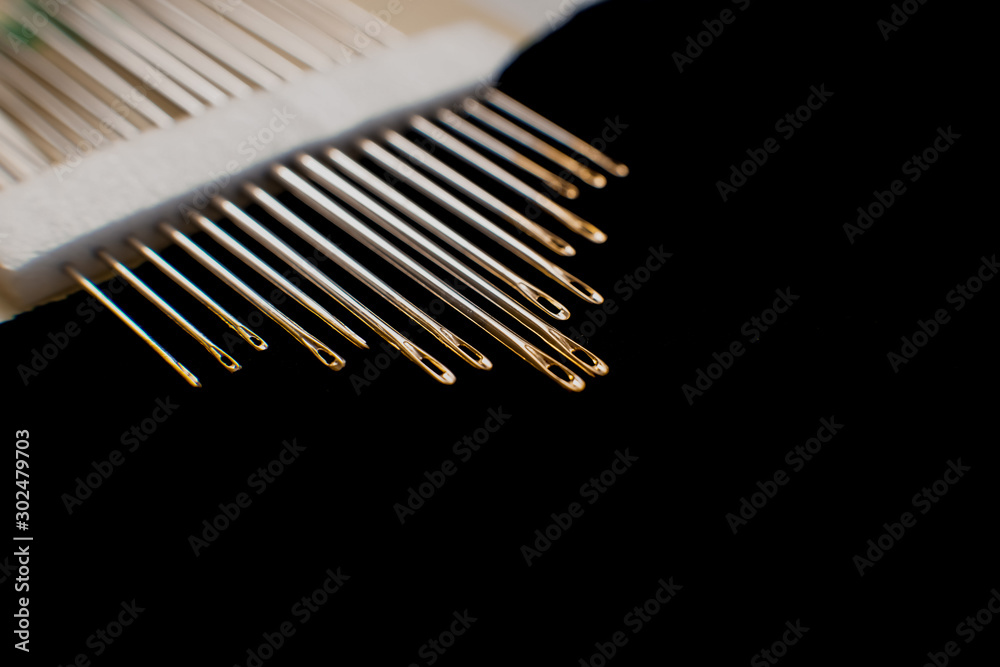 photo macro - many needles on a black cloth photo macro - many needles on a black cloth