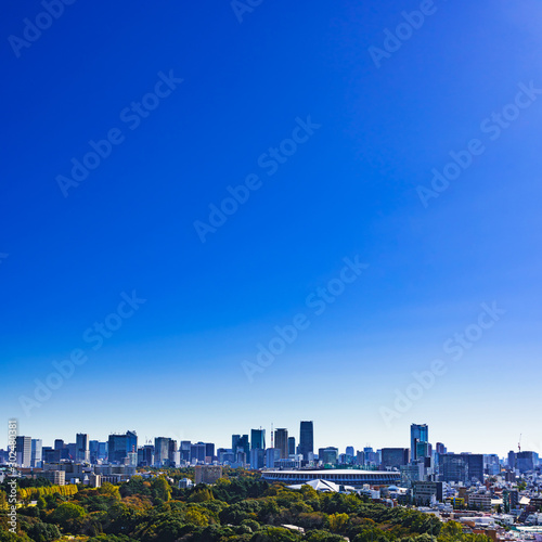 Landscape of national stadium for Tokyo Olympic 2020 in the background of blue sky in Japan   photo