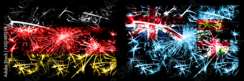 Germany, German vs Fiji New Year celebration travel sparkling fireworks flags concept background. Combination of two abstract states flags. © Vlad