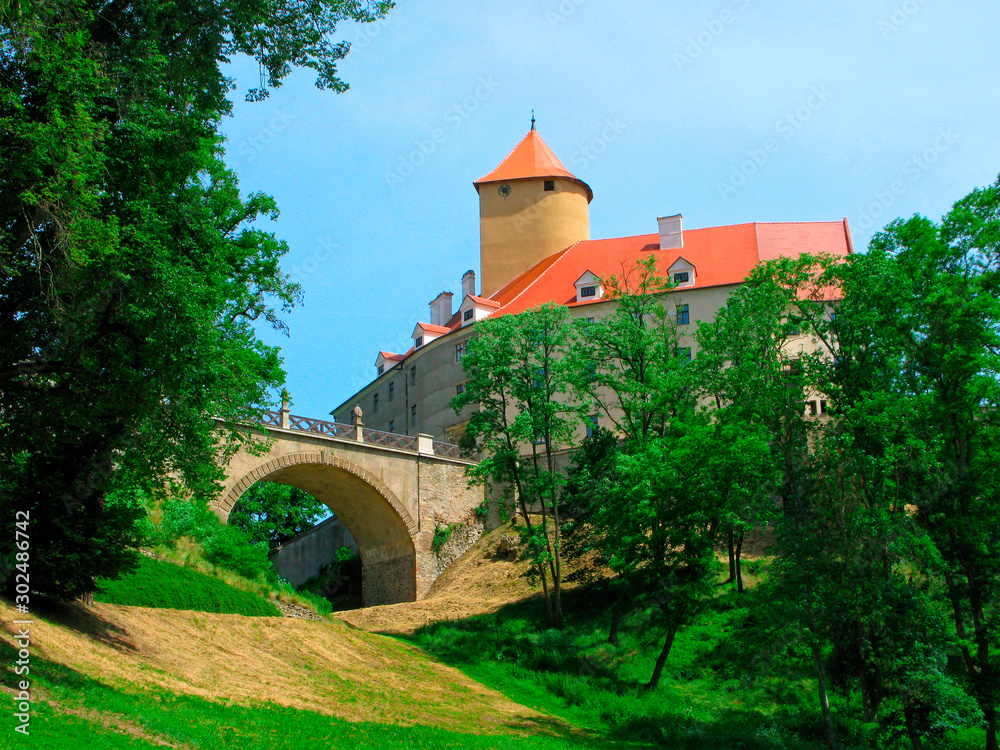 Royal Veveri Castle, Czech Republic. View on the castle with the palace, the castle bridge and trees. The castle is located near Brno centre some 12 km. 