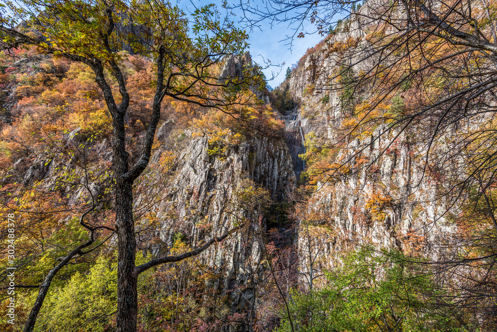 Landscape in Frakto forest in Rodopi with autumn foliage and waterfalls Landscape in Frakto forest in Rodopi with autumn foliage and waterfalls