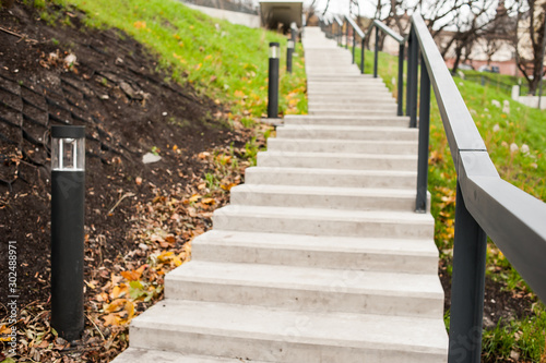 Modern concrete stairs and metal railings outside