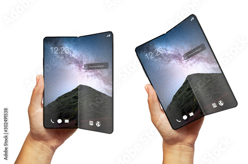 Billede på lærred Woman hand holding Smartphone blank screen with fold feature - modern constructi
