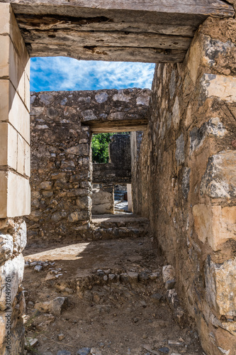 Passage through the ruins of a medieval monastery