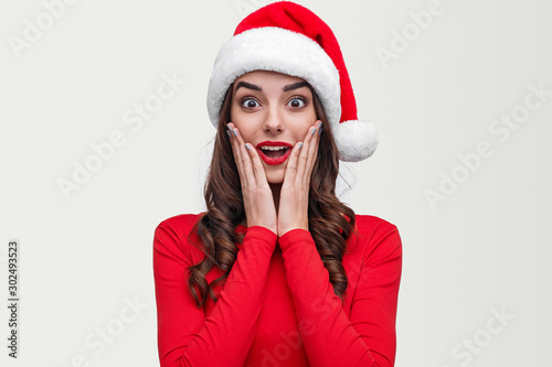 Excited young female on Christmas party