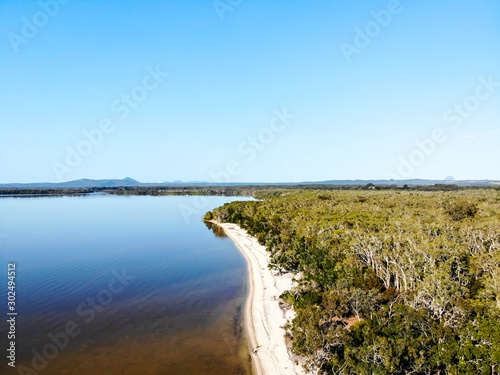 Aerial view of the forest  beach and lagoon at Boreen point  Australia