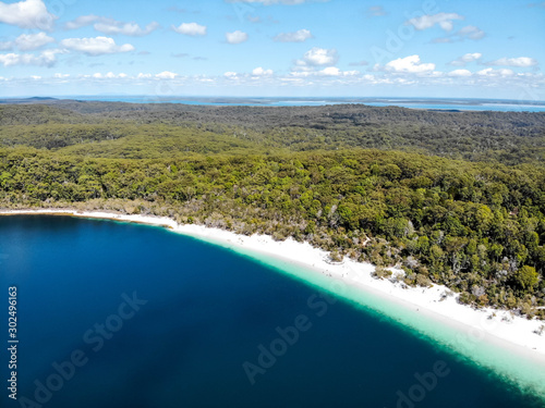 Drone shot toward Lake McKenzie main beach on Fraser Island