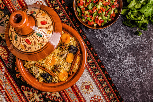 Traditional moroccan tajine of chicken with dried fruits and spices.