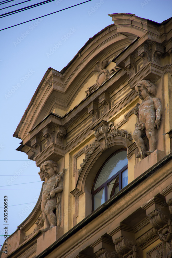 Details of a big city. House with angels. Malaya Konyushennaya Ulitsa (Little Stable Street). Saint-Petersburg/ Russia. Details of a big city. House with angels. Malaya Konyushennaya Ulitsa (Little Stable Street). Saint-Petersburg/ Russia.