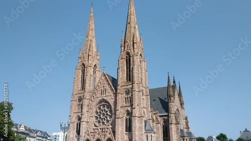 Strasbourg, France. August 2019. View on the St. Paul Church from the Ill river. 30 fps tilt movement. photo