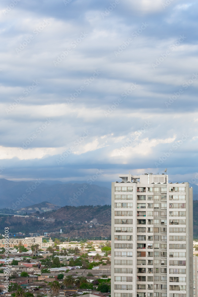 Fototapeta premium building on the right and city and hill