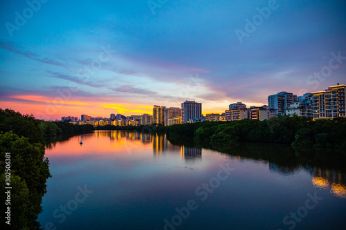 Sanya Cityscape with Sanya River View and Apartment Buildings in the sunset time, Hainan Province, China