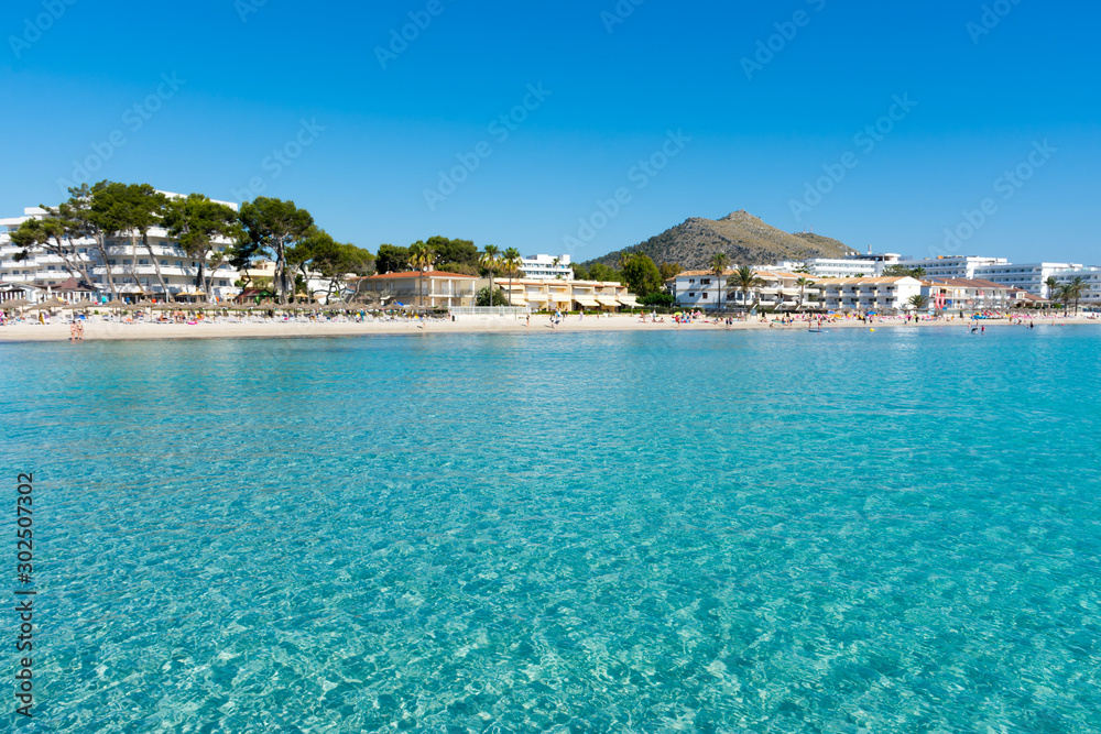 Beach in the resort town of Port Alcudia on the island of Mallorca