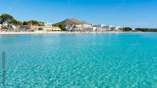 Beach in the resort town of Port Alcudia on the island of Mallorca