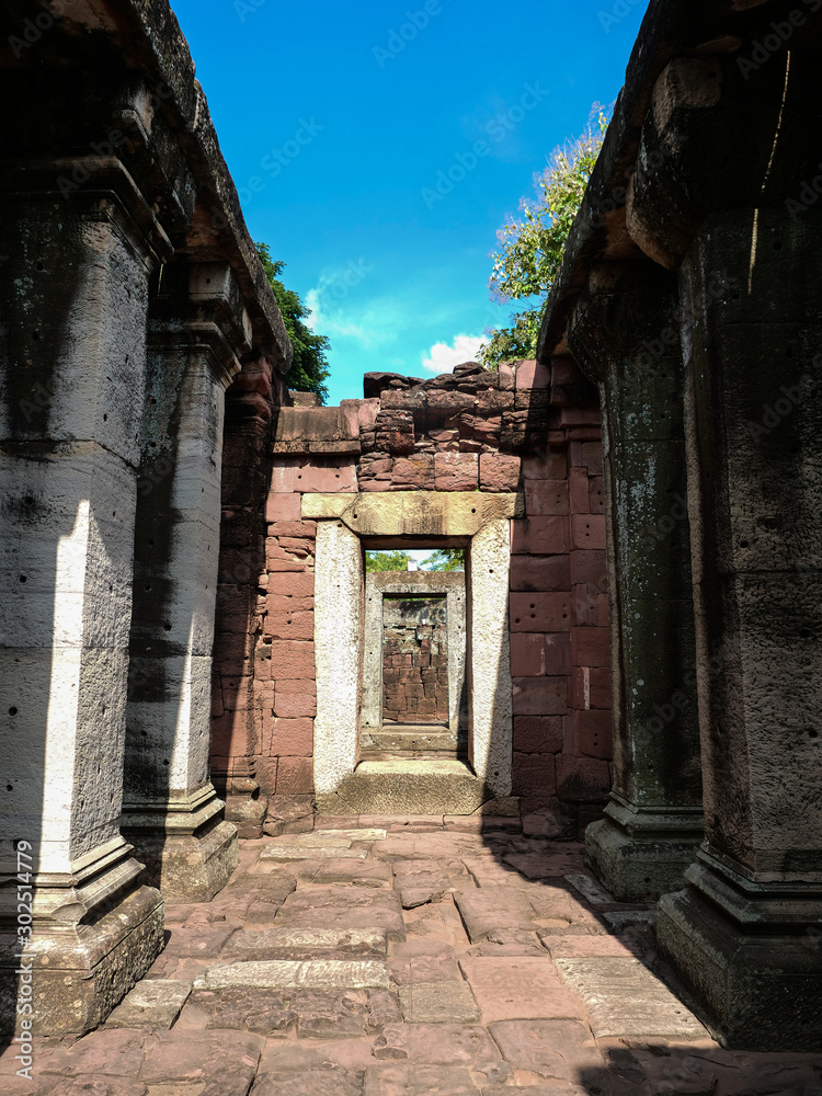The sandstone pillar hall and doorway are stacked beautifully in Prasat Phimai. Tourist attractions in Thailand.