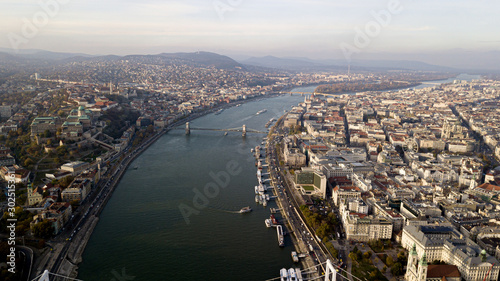 View of Budapest and the capital of Hungary from a height shooting on a drone. The main attractions in the city panorama, bridges, the old city, the palace, parliament. Top view.