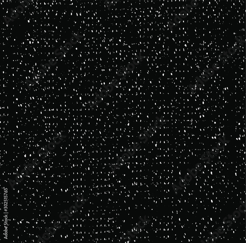 Small uneven spots and particles of debris. Abstract vector texture.  Distressed uneven background. Grunge texture overlay with fine grains isolated on white background. Vector illustration. EPS10.