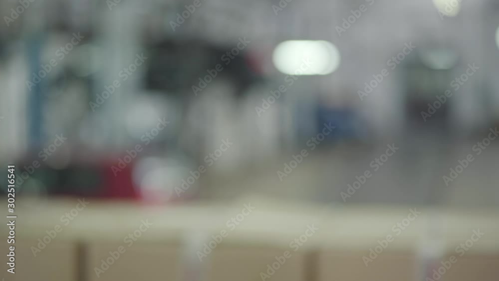 Close-up of young female Caucasian hand taking car keys from male salesman. Woman with nice manicure buying new automobile. Car dealership, car business. Close-up of young female Caucasian hand taking car keys from male salesman. Woman with nice manicure buying new automobile. Car dealership, car business.