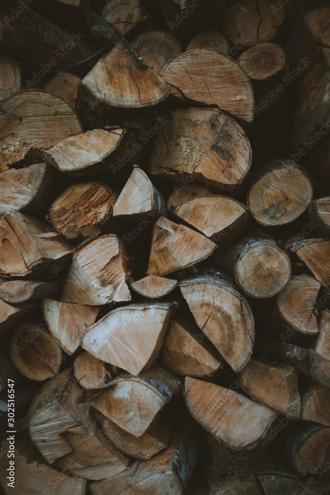 Fototapeta premium Stacked fire wood background pattern