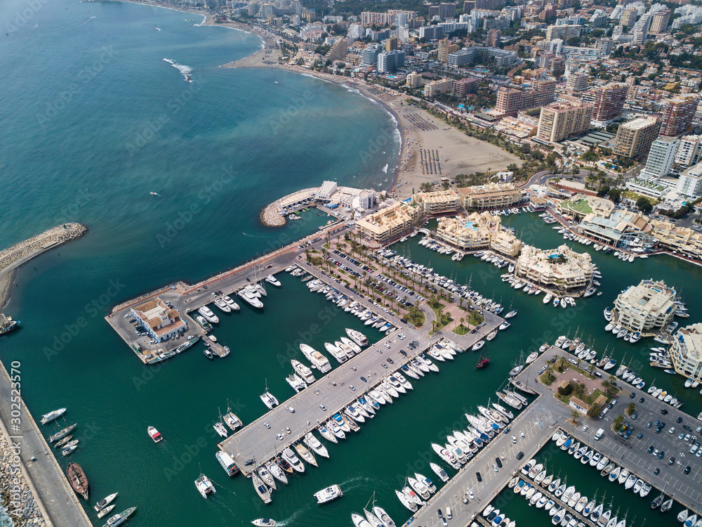 Aerial View of Puerto Mariana, from Benalmadena, popular touristic attraction in South of Spain , Malaga