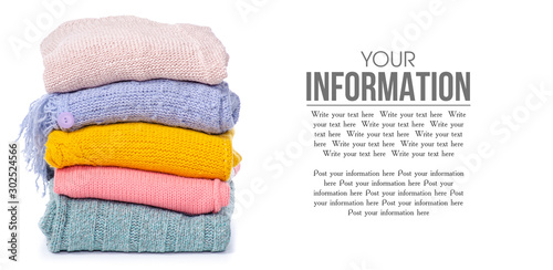 Stack color sweaters on white background isolation, space for text