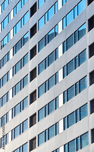 Close up picture of a skyscraper facade, architectural background.