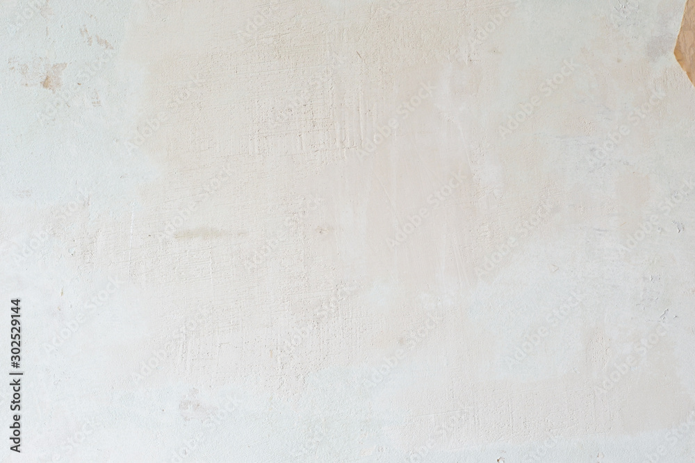 Light old wall without a ceiling. Grunge gray wall. Background texture of putty wall. Light old wall without a ceiling. Grunge gray wall. Background texture of putty wall.