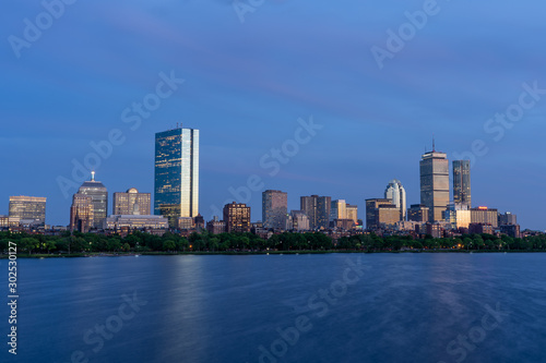 Dusk view of Boston Skyline by Chalres River in summer time
