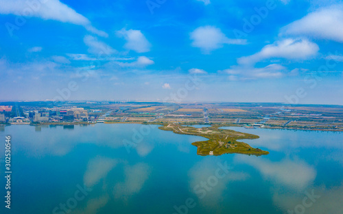 Fototapeta Naklejka Na Ścianę i Meble -  Panoramic aerial photographs of the scenery of the Drip Lake in Pudong New Area, Shanghai, China