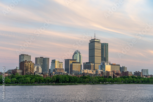 Sunset view of Boston Skyline by Chalres River in summer time