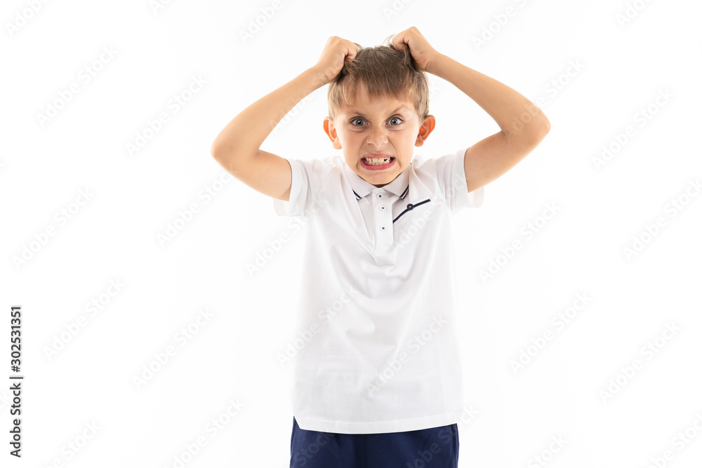 Portrait of a little caucasian boy is angry and screaming Portrait of a little caucasian boy is angry and screaming