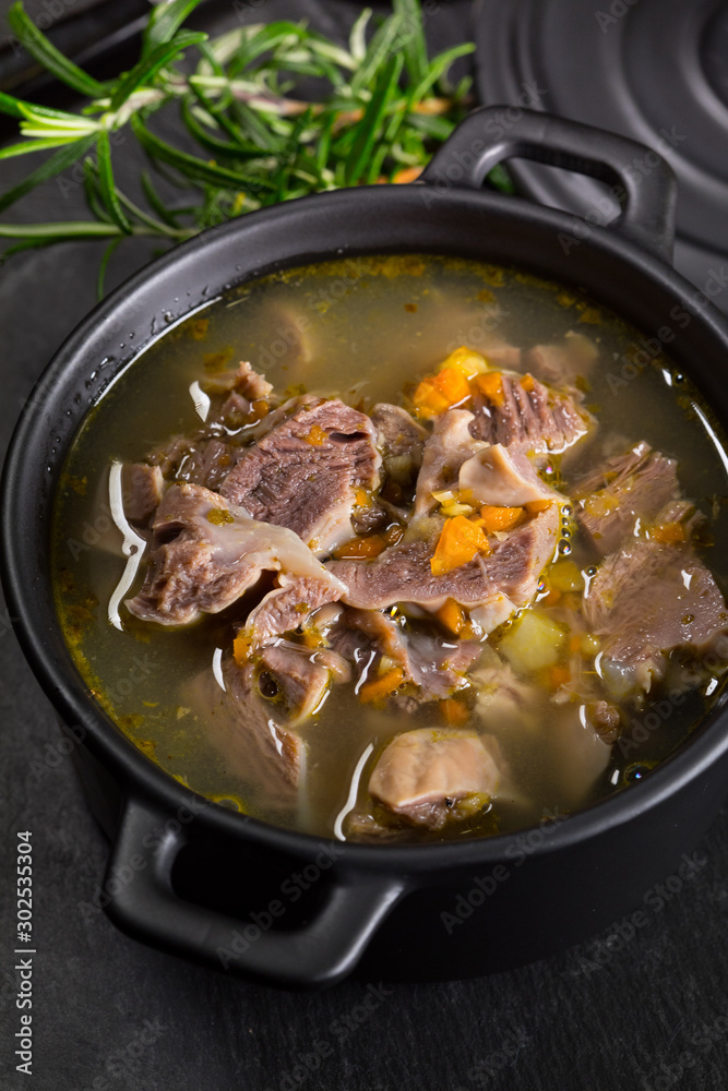Chicken gizzards stewed with carrot in sauce. Chicken gizzards stewed with carrot in sauce.