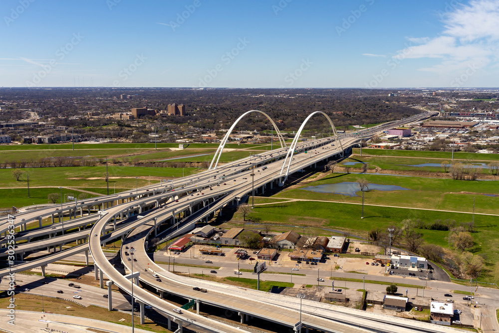 Dallas, Texas skyline cityscape massive construction of highways and overpasses transportation infrastructure.