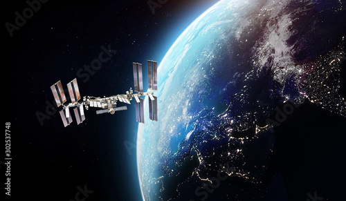 Fototapeta Naklejka Na Ścianę i Meble -  Interntaional space station. ISS station on orbit of the Earth planet. Elements of this image furnished by NASA