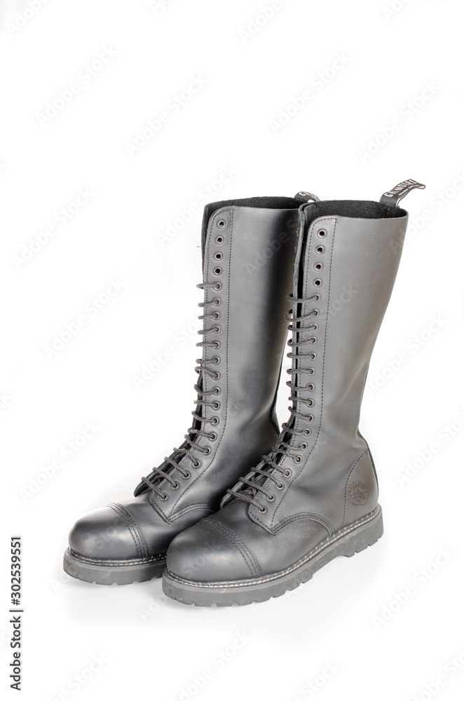 New knee high lace up black combat boots foto de Stock | Adobe Stock