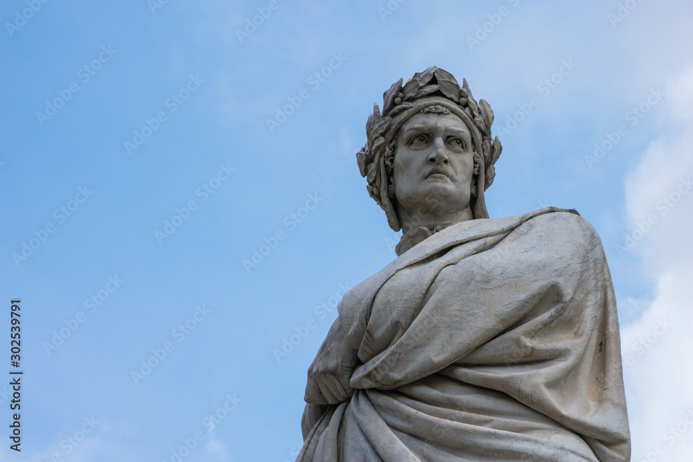 Dante Alighieri statue in florence, italy, close up. Italian writter