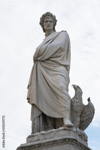 Dante Alighieri statue in florence, italy, close up. Italian writter